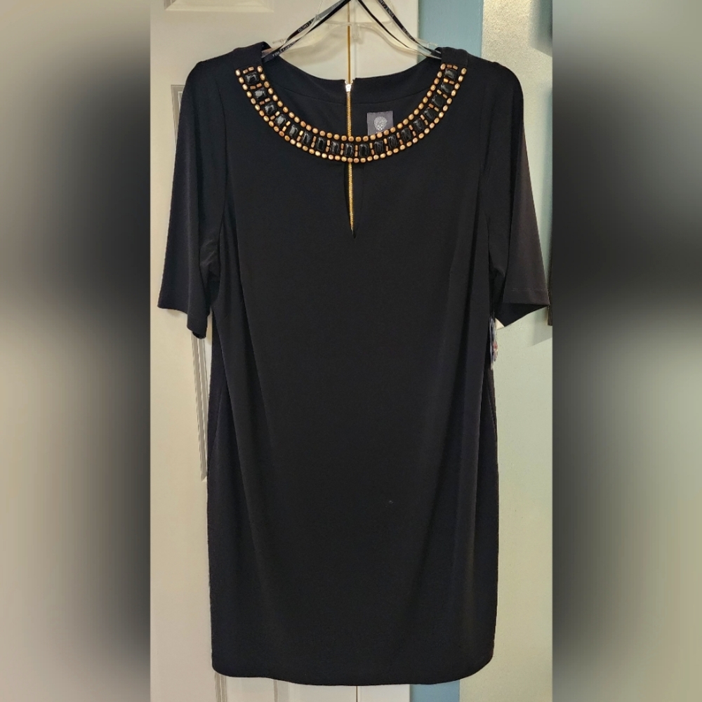 Vince Camuto Black dress 18 w to knee or above  depending on your height.